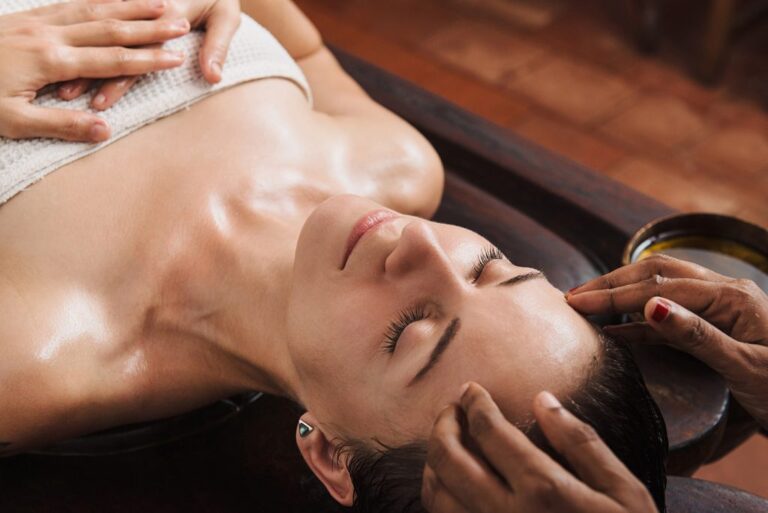 ayurvedic-face-massage-with-oil-on-the-wooden-tabl-2022-11-11-10-07-54-utc-1024x684